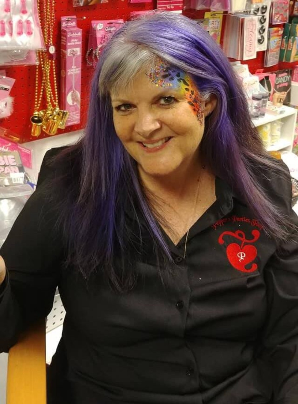 Kathi at Pepper's Parties wearing the store logo