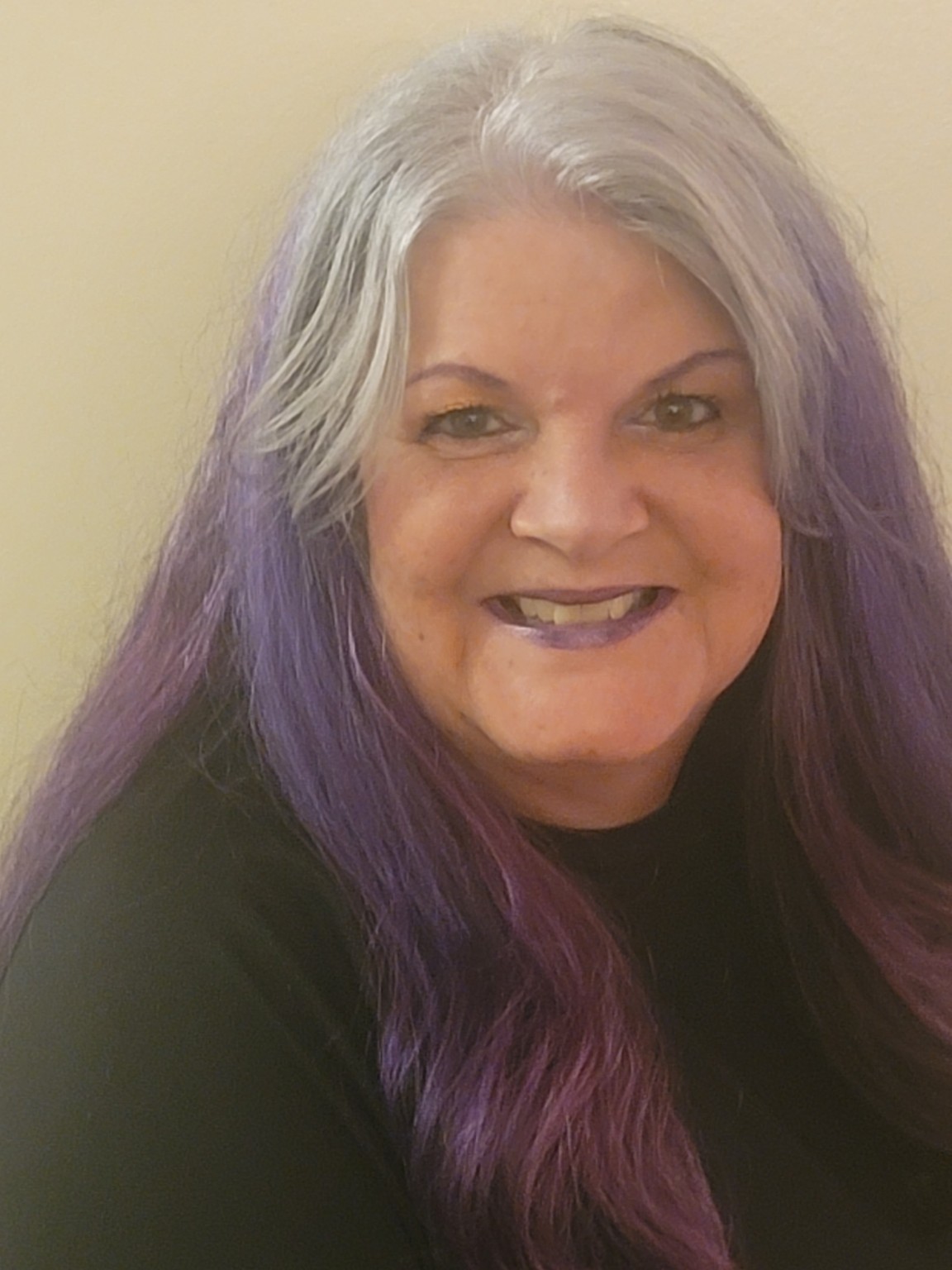 Current portrait of Kathi Pepper with purple and silver hair